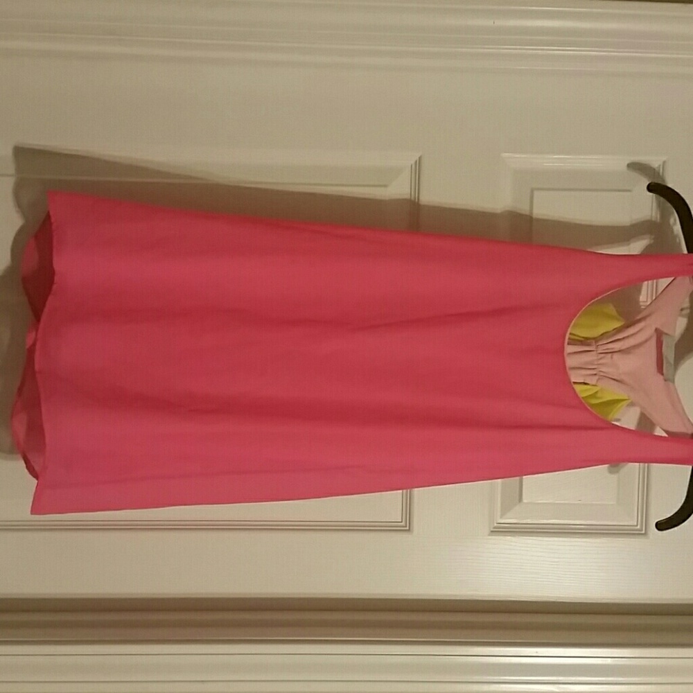 Fluorescent pink dress with fluorescent yellow bow